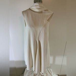 Chloe  - sleeveless white silk dress.  Two side pockets, with neck scarf